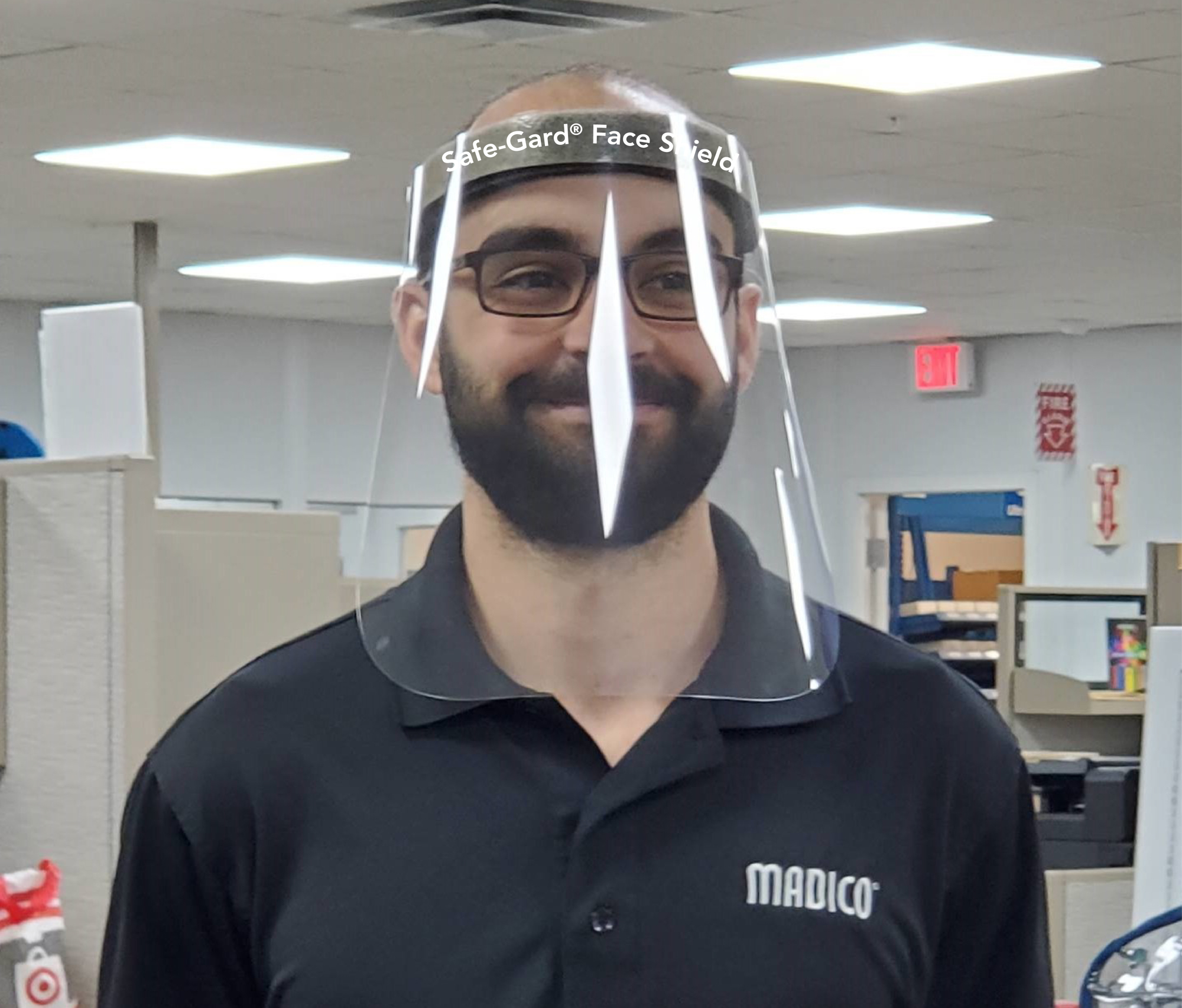 Courtesy. Madico Product Engineer Armando Acosta wearing one of the company's face shields.