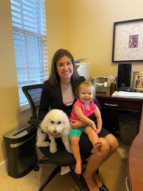 Shannon Puopolo has been an attorney with Henderson Franklin since 2009. Her officemate is their daughter, 14-month-old Audrey Stokke.