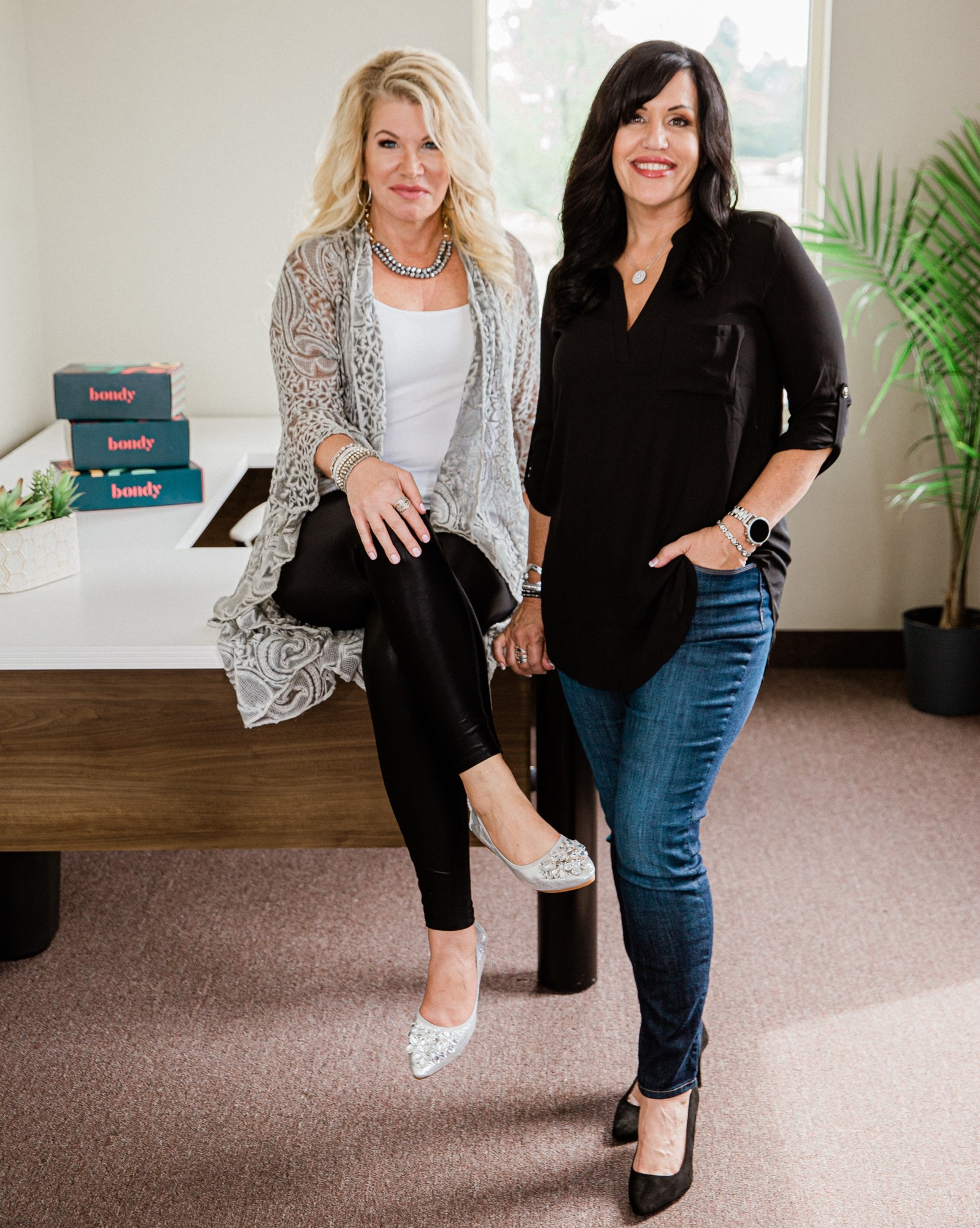 Cutline. Kimberly Martinez, left, and Lisa Harrington are positioning their new company, Bondy, as a way to reach out to remote employees.