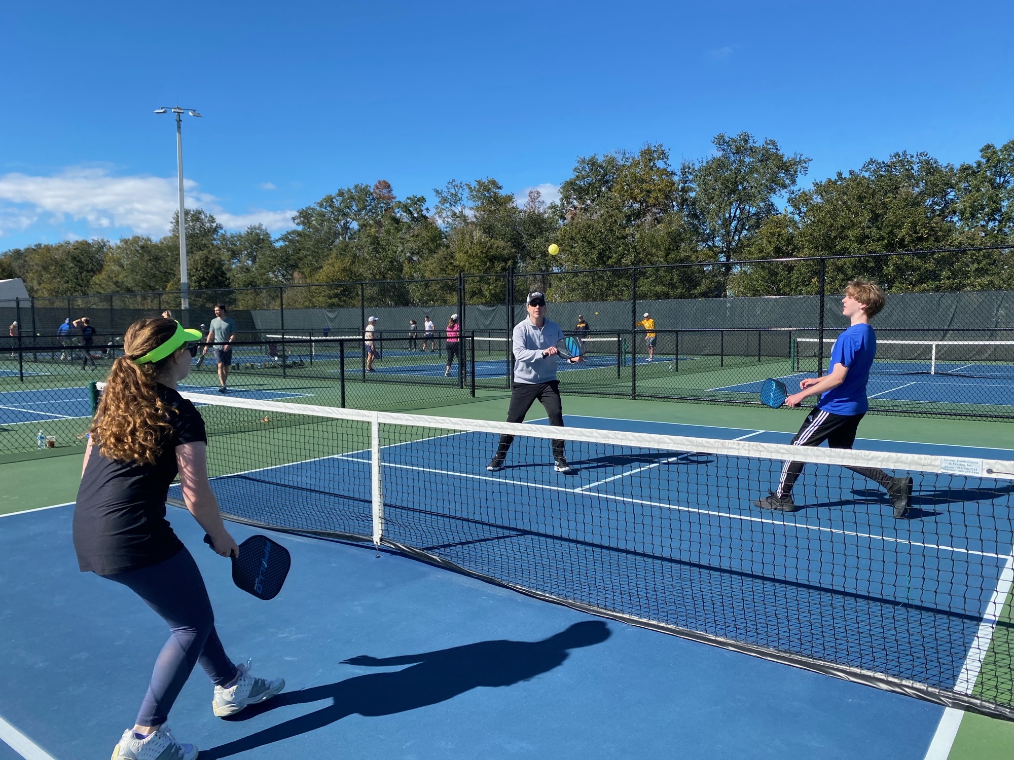 Courtesy, Leslie Healy. In addition to playing with colleagues, Michael Healy also regularly plays pickleball with his family, including his children, Asher and Kate Healy.