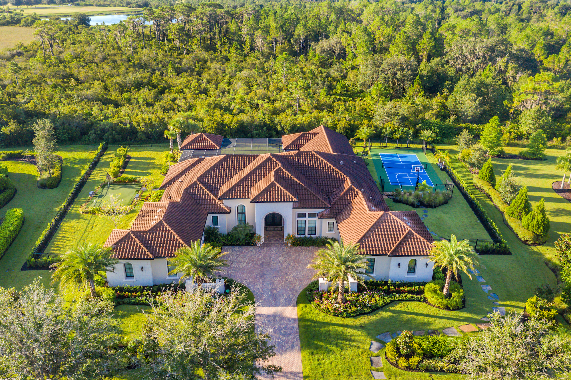 Courtesy. Tina Ciaccio of Michael Saunders & Co. represented the seller of 19422 Newlane Place in Bradenton's The Concession. The property, with many outdoor living features buyers are looking for now, sold for $1.865 million.