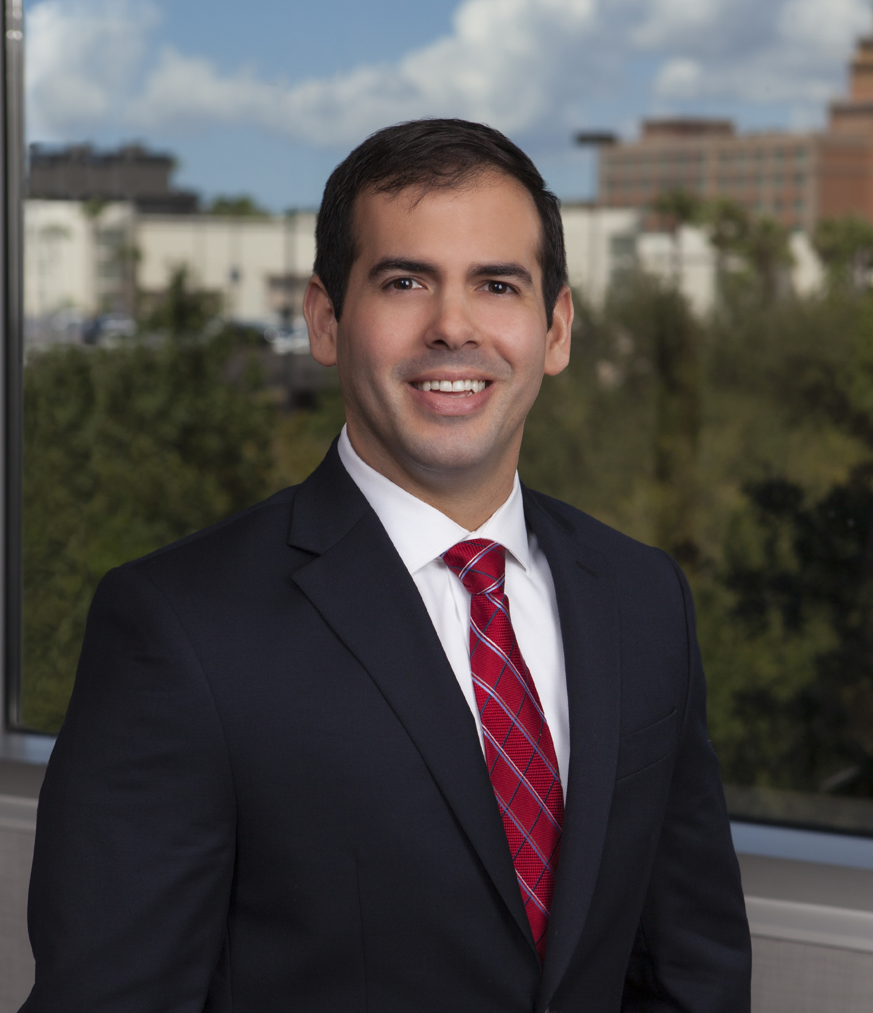 Courtesy. In Tampa, Raciel Perez is a member of the Real Estate Practice Group. 