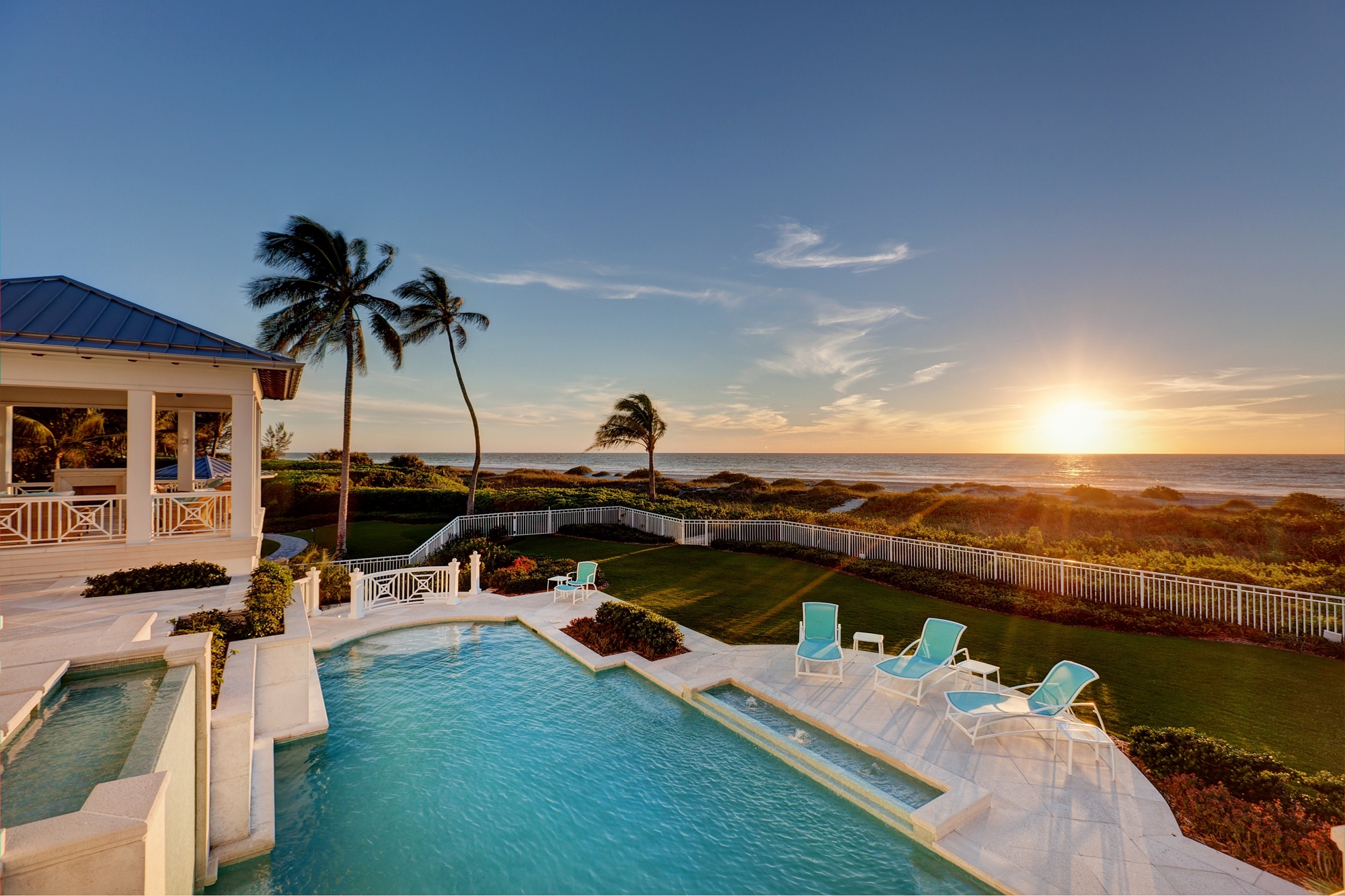 Courtesy. The Caribbean-style manor home is situated on more than two acres and boasts more than 200 feet of Gulf frontage. 