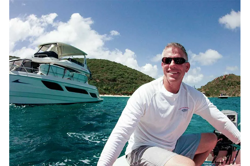 File. MarineMax President and CEO Brett McGill enjoys some time on the water.