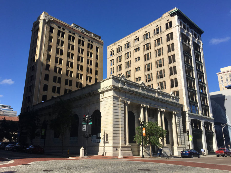 The Marble Bank Trio at Laura and Forsyth streets is slated for a hotel, restaurant, grocer and other uses.