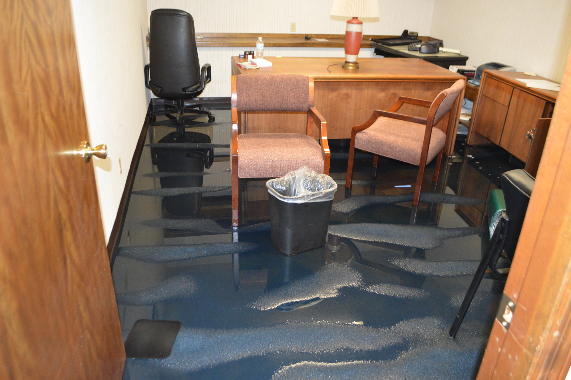 First Coast Mediation and Arbitration’s East Bay Street office received at least two feet of flooding during Hurricane Irma. Floors were soaked Tuesday.   (Photo by David Cawton)