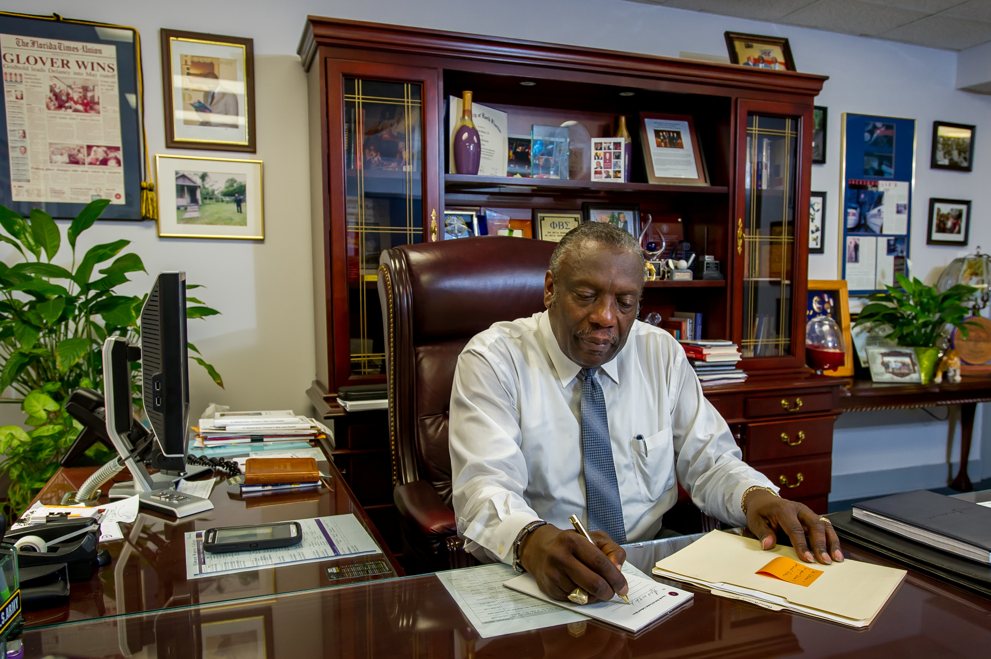 Edward Waters College President Nathaniel Glover Jr. is stepping down from the role in May.
