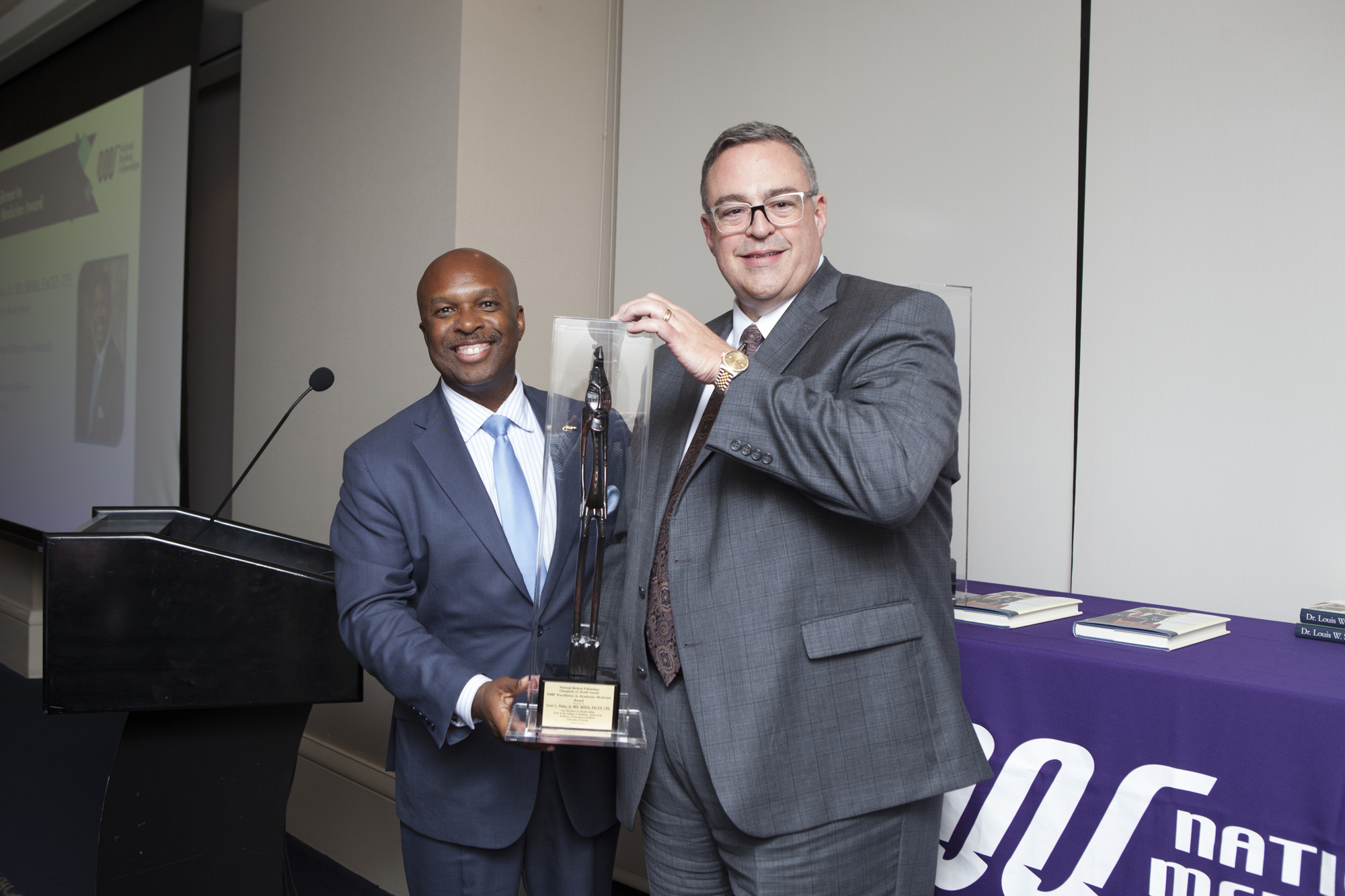 Leon Haley Jr., left, winner of the National Medical Fellowships’ Excellence in Academic Medicine Award for 2017.