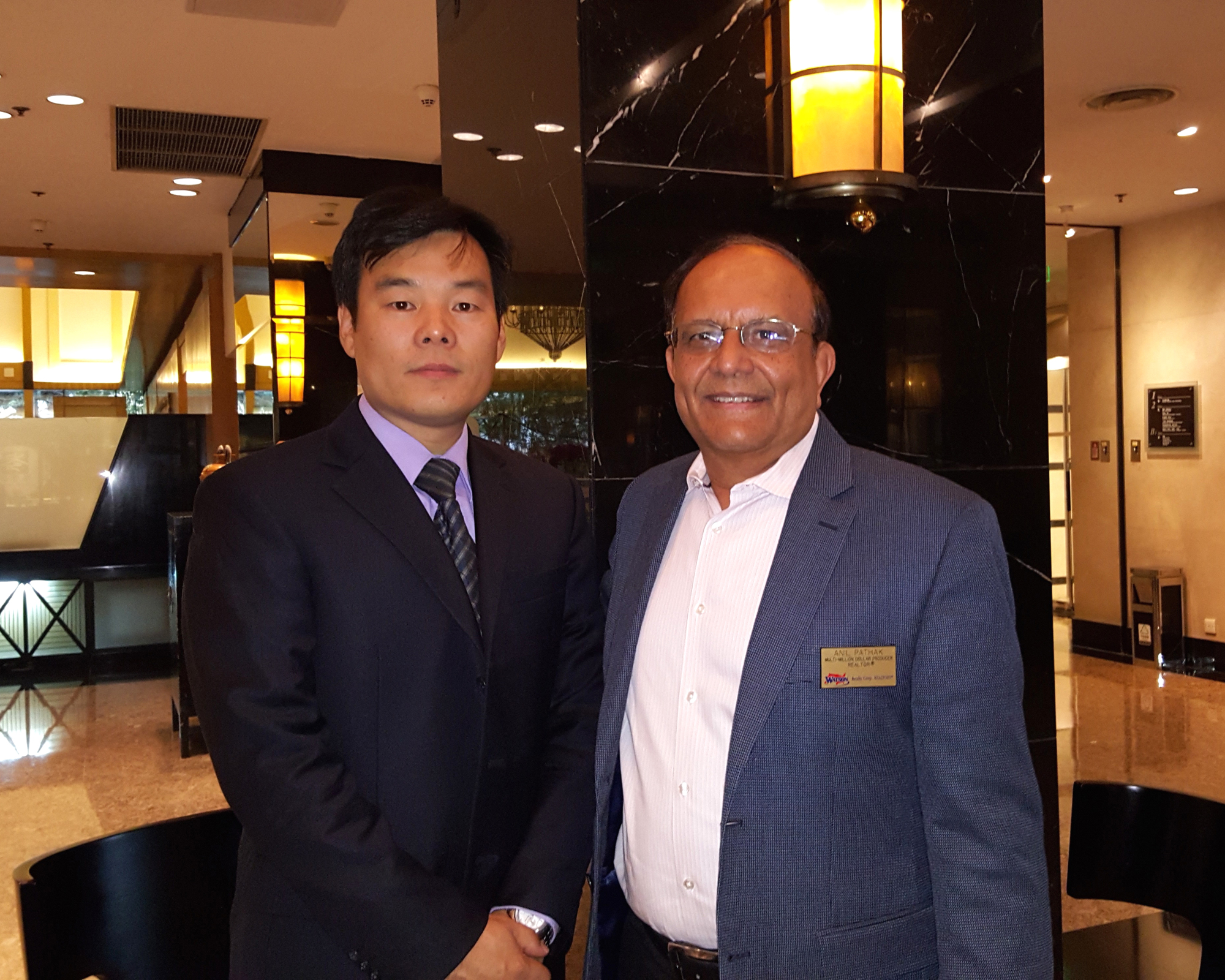 Leo Xiao of APP Mobility and Anil Pathak of Watson Realty.