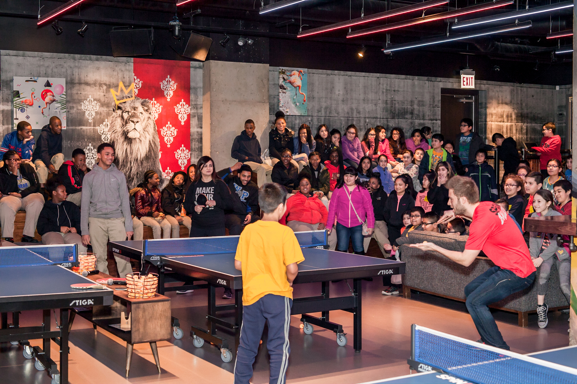 Kids take part in an event for World Table Tennis Day on April 6  at the SPiN pingpong club in Seattle.