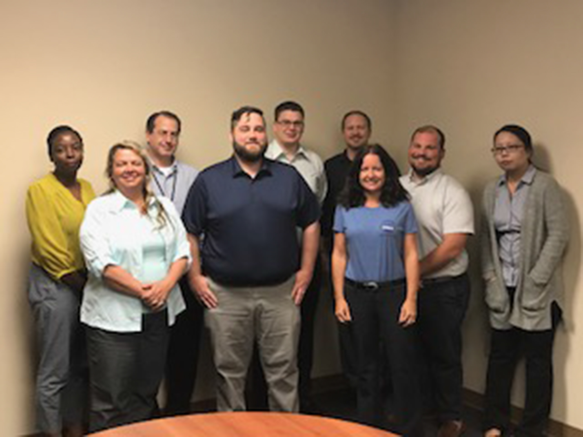 Back row, from left, Felicia Wilcox, John Tanner, Andrew McKinney, William Rothrock, Zachary Taylor and Yuemin Zhu. Front row, from left, Donna MacRae, Darren Foster and  Karen Millard.