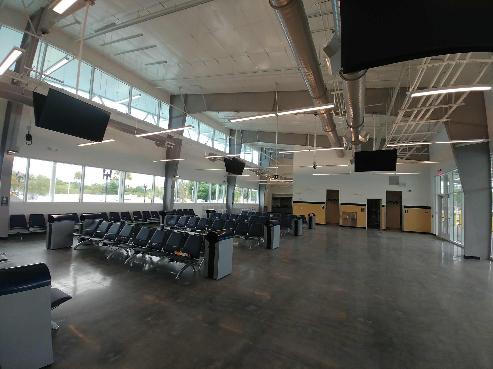 The waiting area of the new Greyhound bus terminal features an open floor plan. 