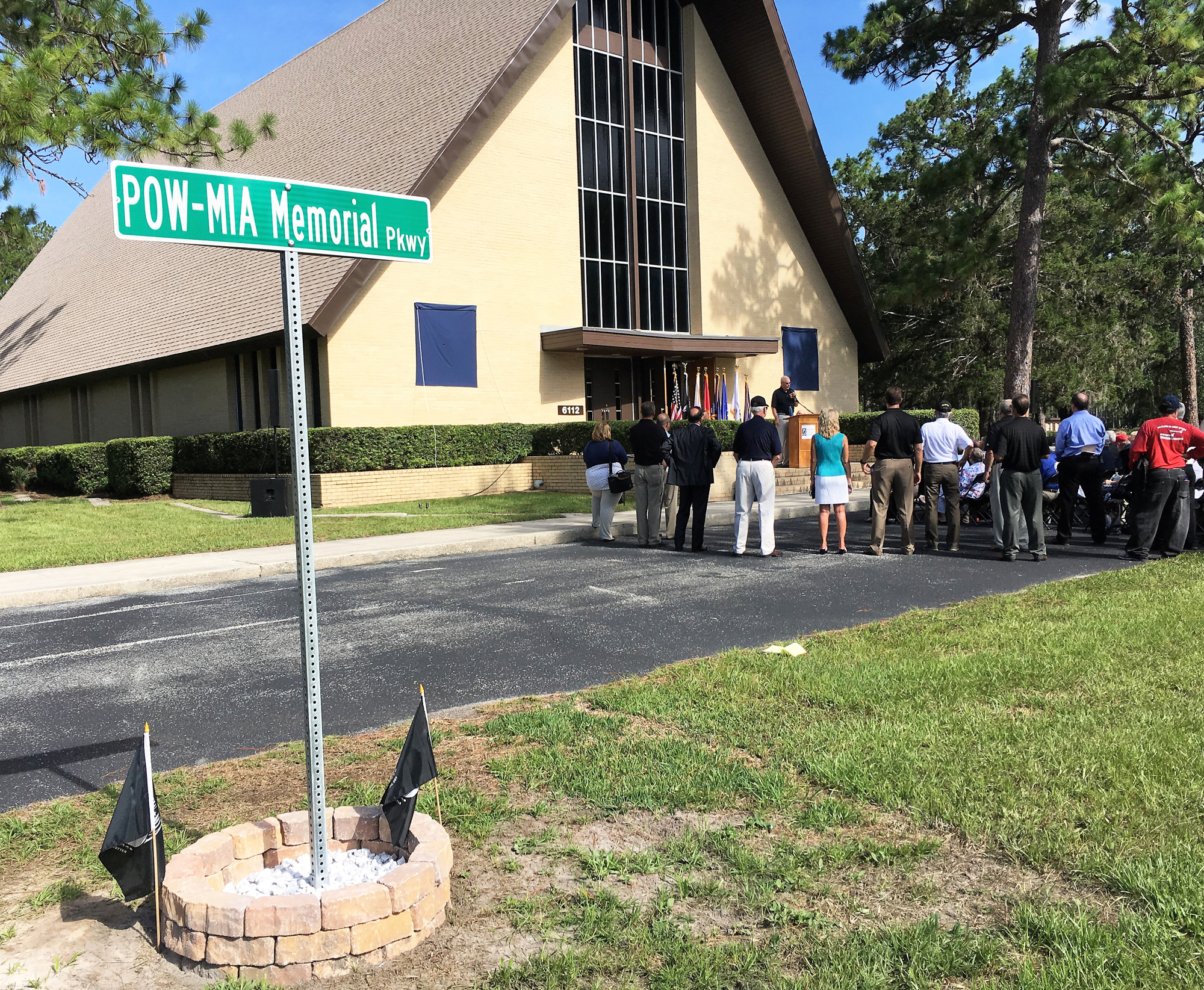 A road that runs past the chapel was renamed and recognized at Tuesday's ceremony as the POW-MIA Memorial Parkway.
