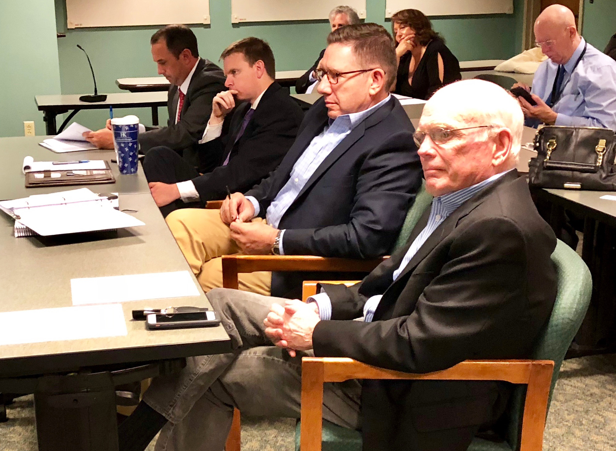 Developers Michael Munz and Peter Rummell watch as the Downtown Investment Authority approves their plans for The District, a Southbank mixed-use project on April 11.