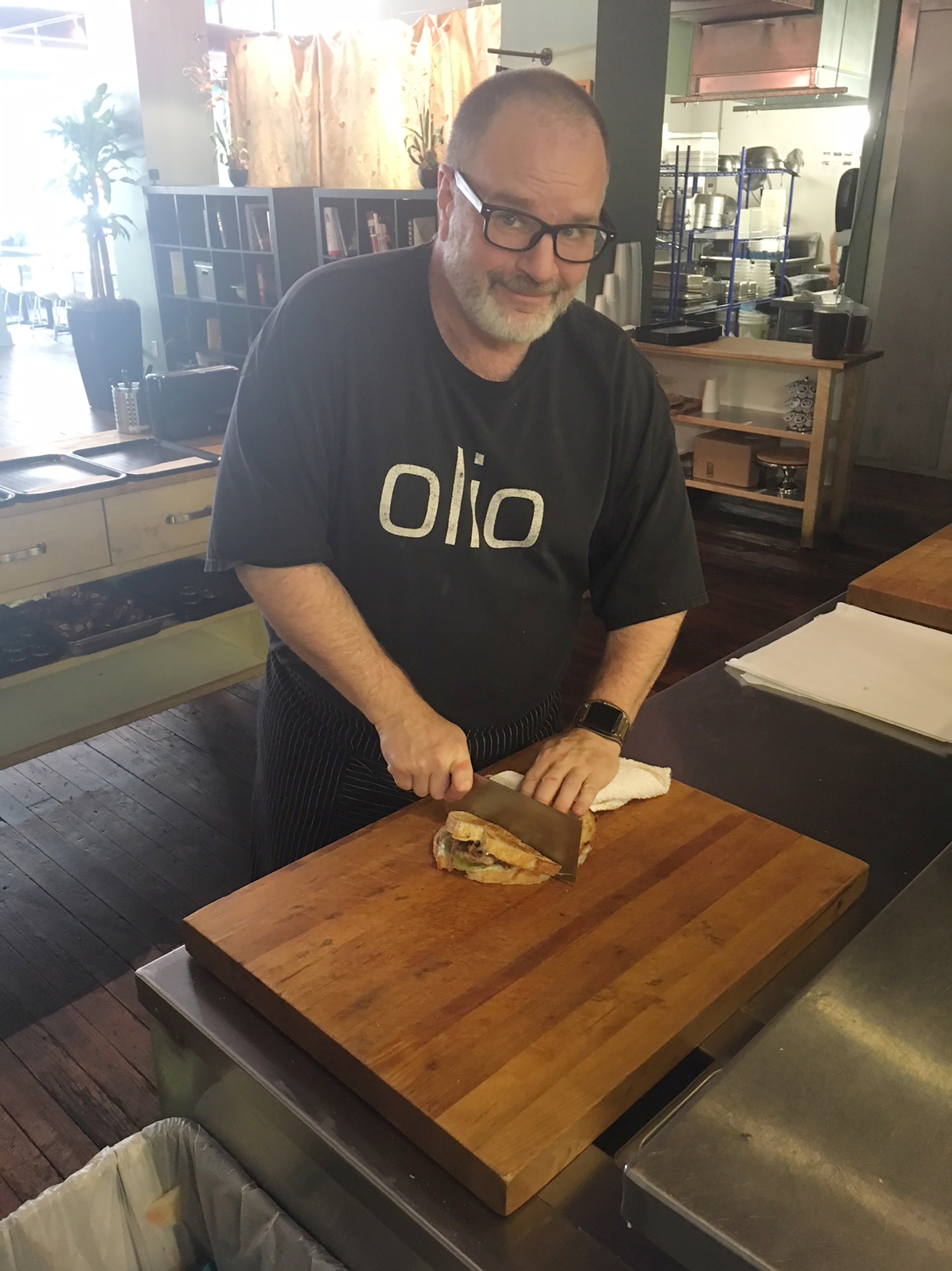 Greg Desanto, executive chef and owner of Olio, makes the duck grilled cheese featured on “Adam Richman’s Best Sandwich in America.”