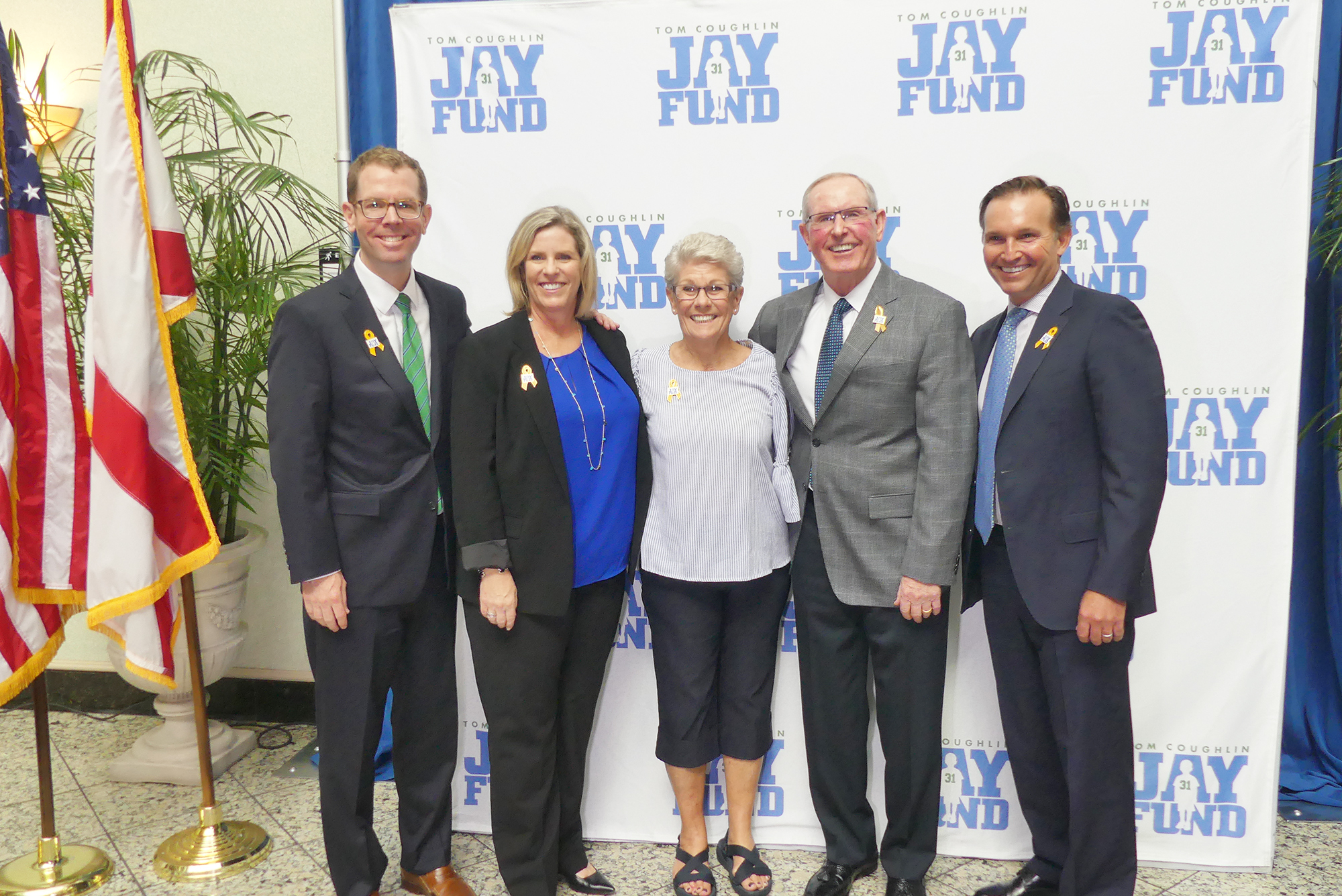 The Coughlin family, from left, Brian, Keli, Judy and Tom with Mayor Lenny Curry after Curry proclaimed Wednesday “Tom Coughlin Jay Fund Day” in Jacksonville.