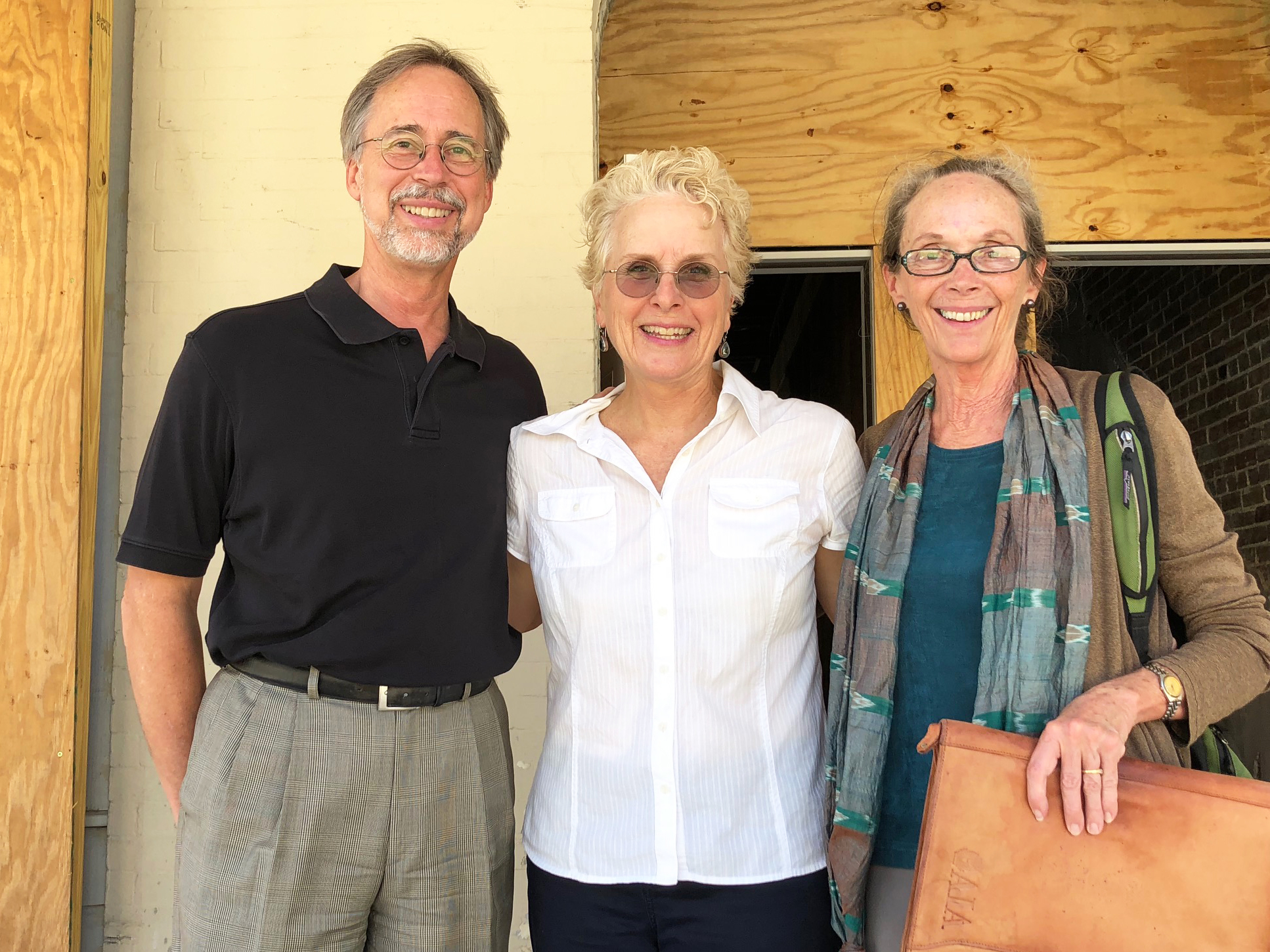 From left, architect Bill Bishop, building owner JoAnn Tredennick and architect Melody Bishop are working on the project to restore the Elena Flats.