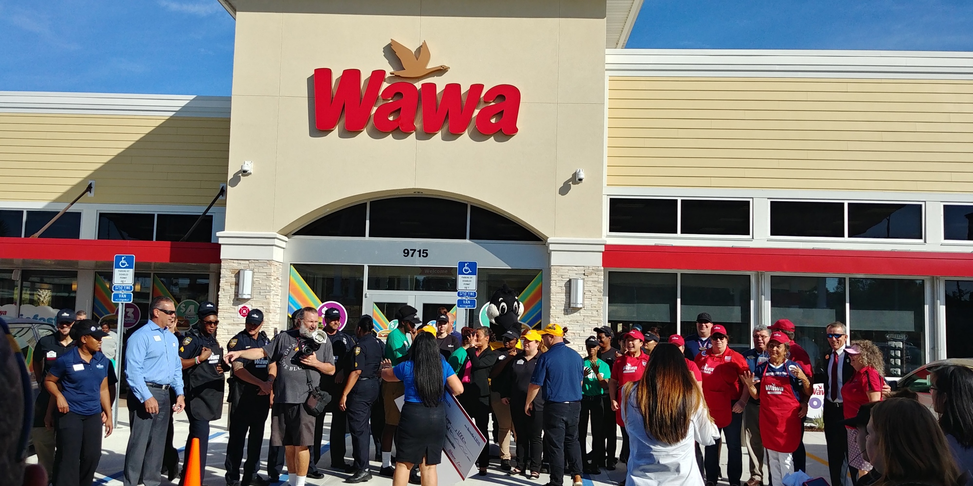 A crowd gathers outside the new Beach Boulevard Wawa during grand-opening festivites.
