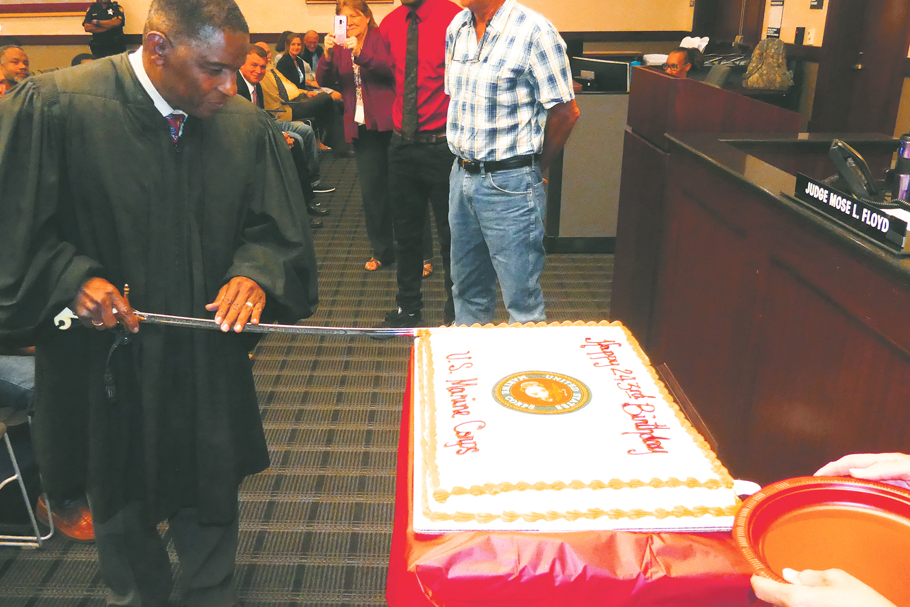 Duval County Judge Mose Floyd, a retired U.S. Marine Corps lieutenant colonel, used his officer’s sword to cut a cake to celebrate the Marines’ 243rd birthday, part of the Veterans Treatment Court proceedings Wednesday.