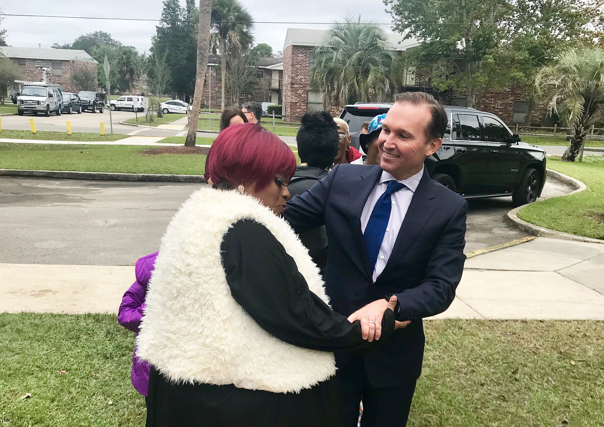 Mayor Lenny Curry spoke with and posed for pictures with residents before and after the groundbreaking.