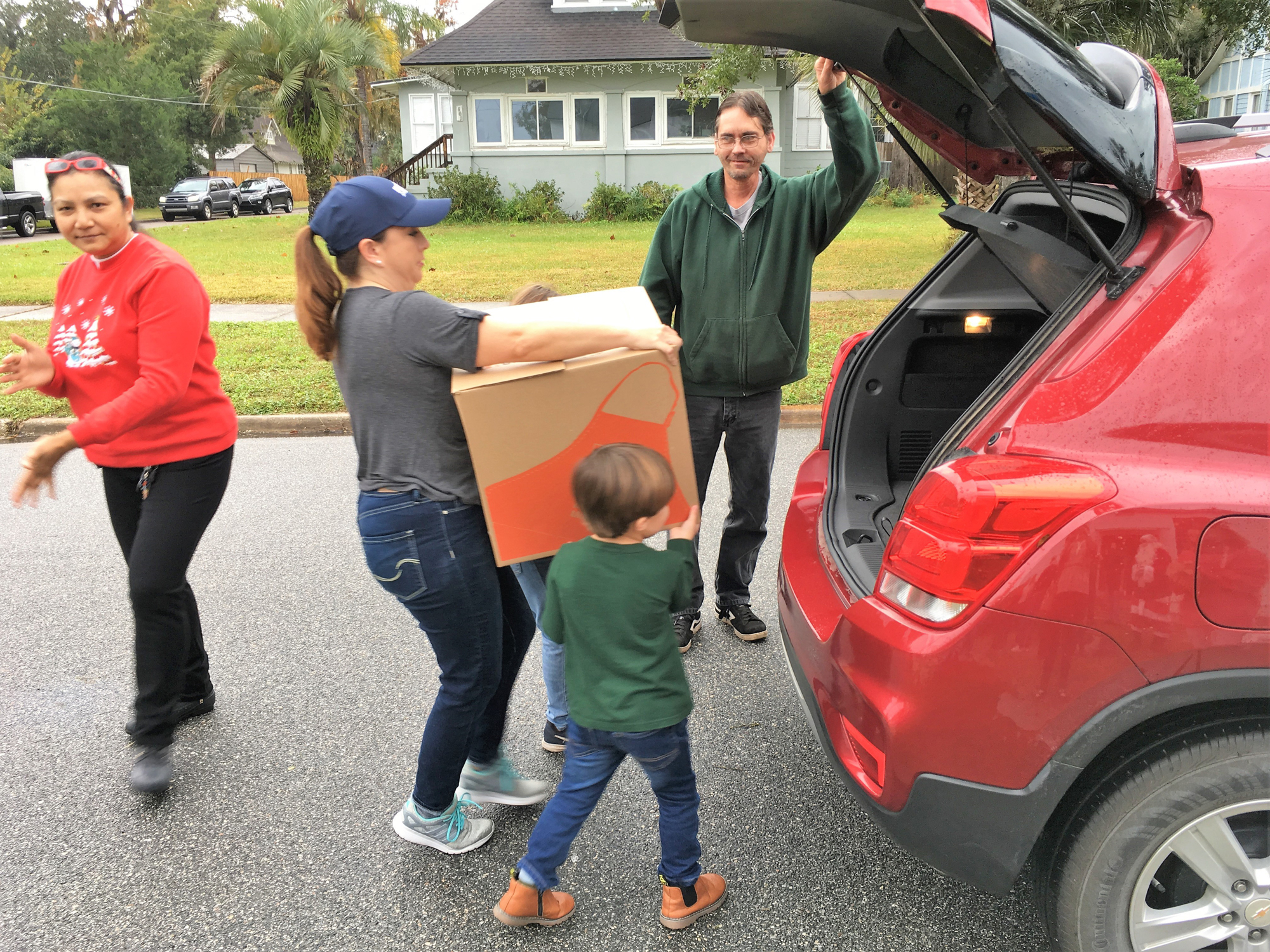 Volunteers with the Clay Builders Council and the Food Pantry of Green Cove Springs load up food boxes Dec. 15 to provide needy families with a traditional Christmas dinner.