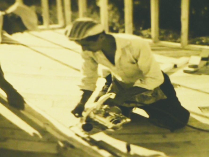 J. Rene Dostie, the patriarch of Dostie Homes, is seen in this undated photo working to build a home on a job site.