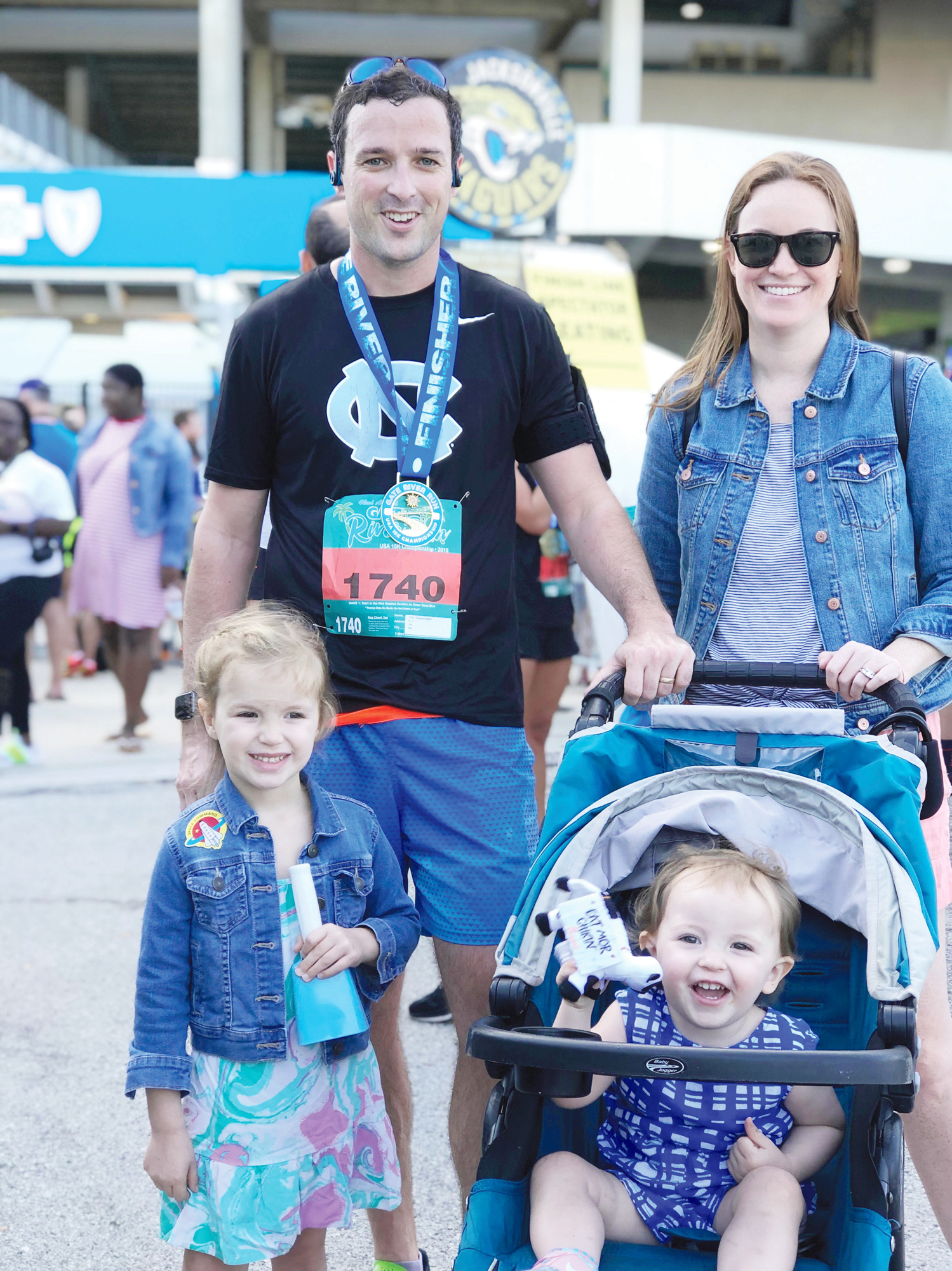 Attorney and avid runner Chuck Griffith with his wife, Lauren, and daughters Ginny, 4, and Maggie, 1.