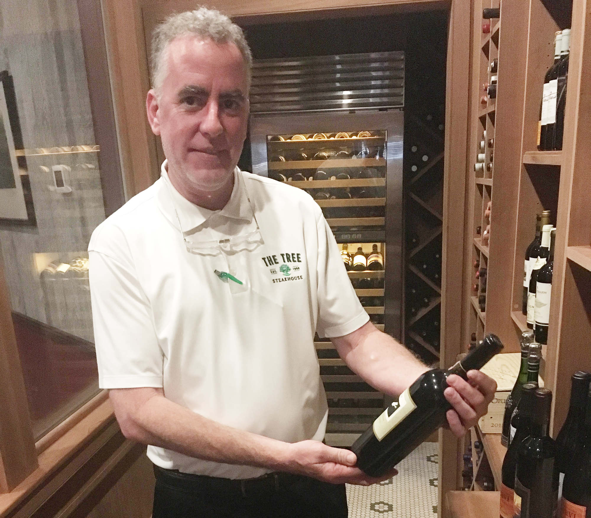 Joe Foster, The Tree Steakhouse managing partner and executive chef, inside the restaurants climate controlled wine cellar at 11362 San Jose Blvd. in The Gates of Olde Mandarin shopping center.