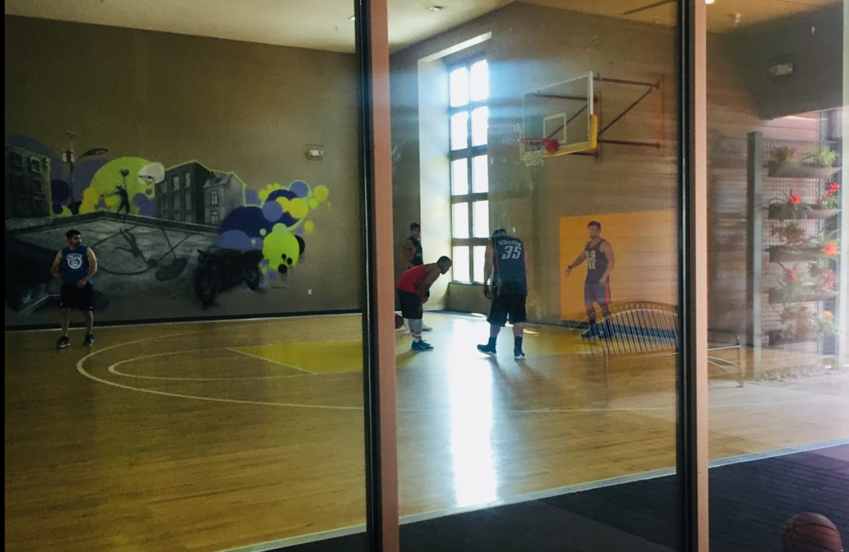 Indoor basketball court in clubhouse.