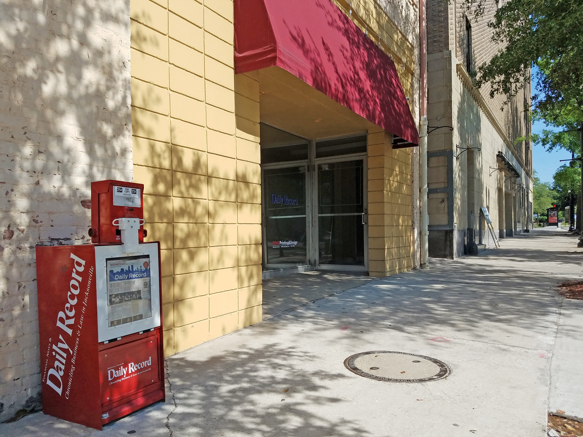 The entrance to the Daily Record on Newnan Street. The newspaper will move to the 121 Atlantic Place building at 121 W. Forsyth St.