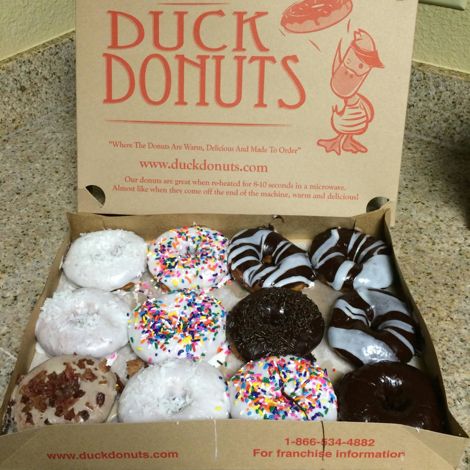 Duck Donuts allows customers to create their own combination of coatings, toppings and drizzles.