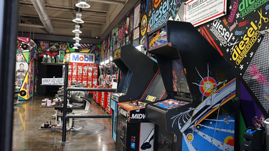 Vintage arcade games are part of the Diesel Barbershop experience.