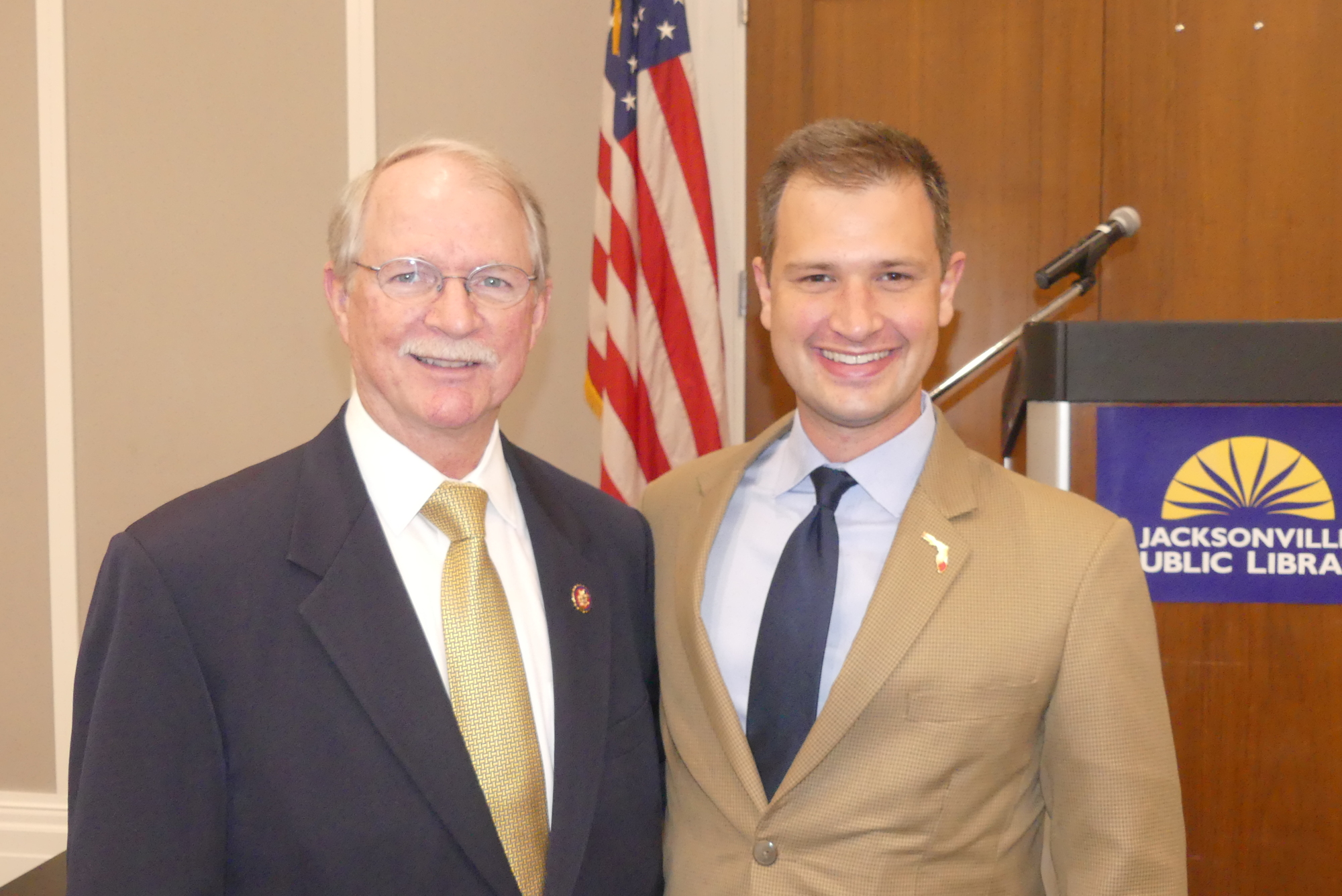 U.S. Rep. John Rutherford, left, and Rogers Towers business attorney Adam Brandon, president of the Jacksonville Lawyers Chapter of the Federalist Society.