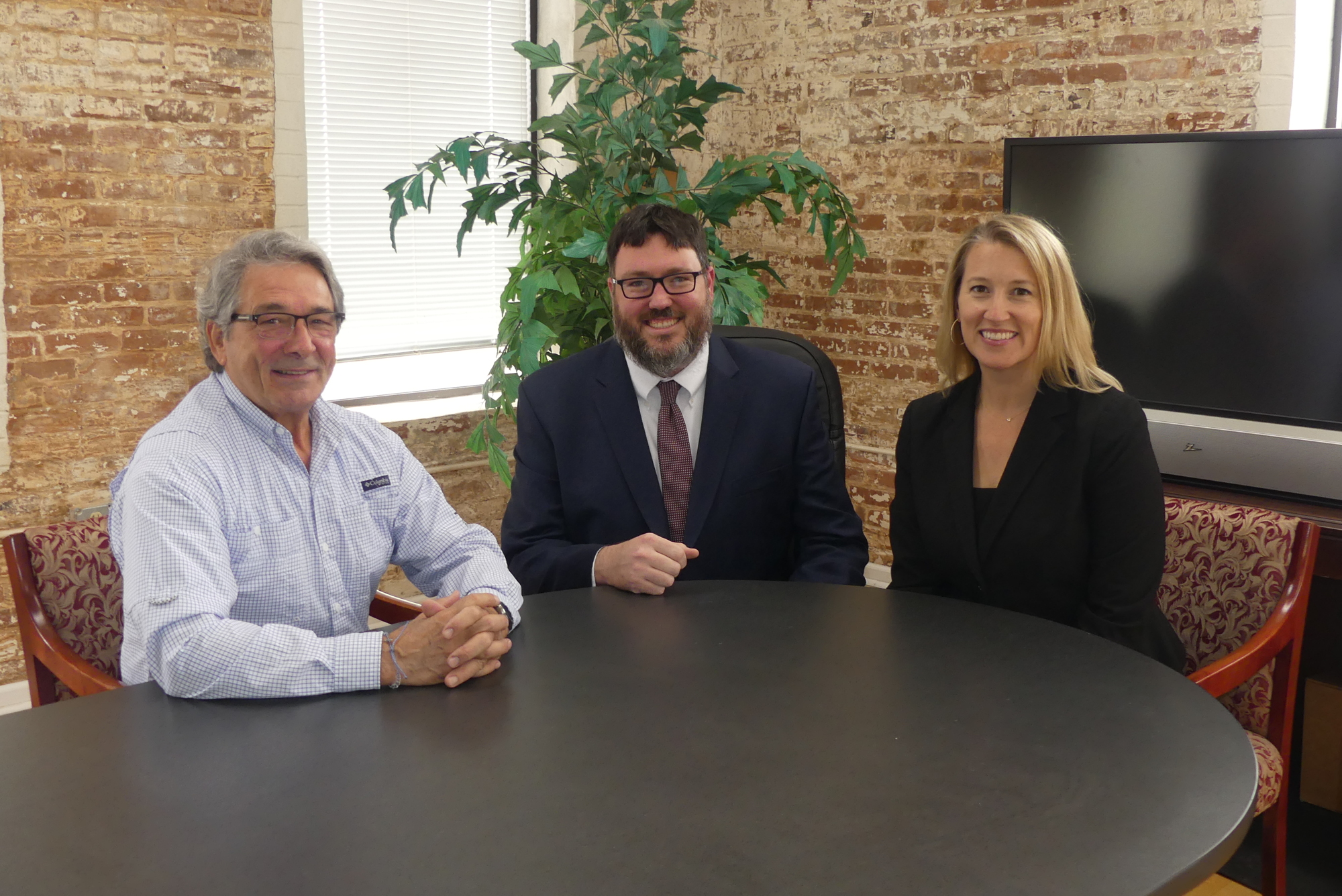 From left, former JBA Executive Director Jim Bailey, his successor, Craig Shoup and Dearing.