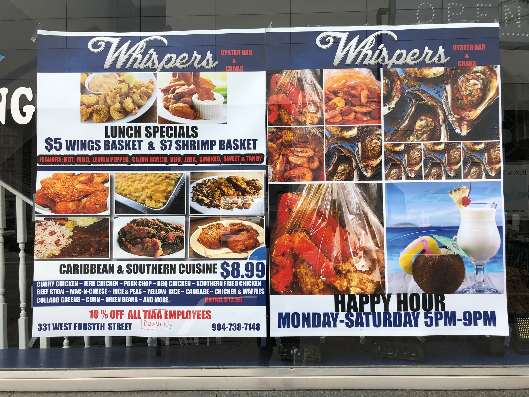 A sign at Whispers promotes the restaurant's offerings.
