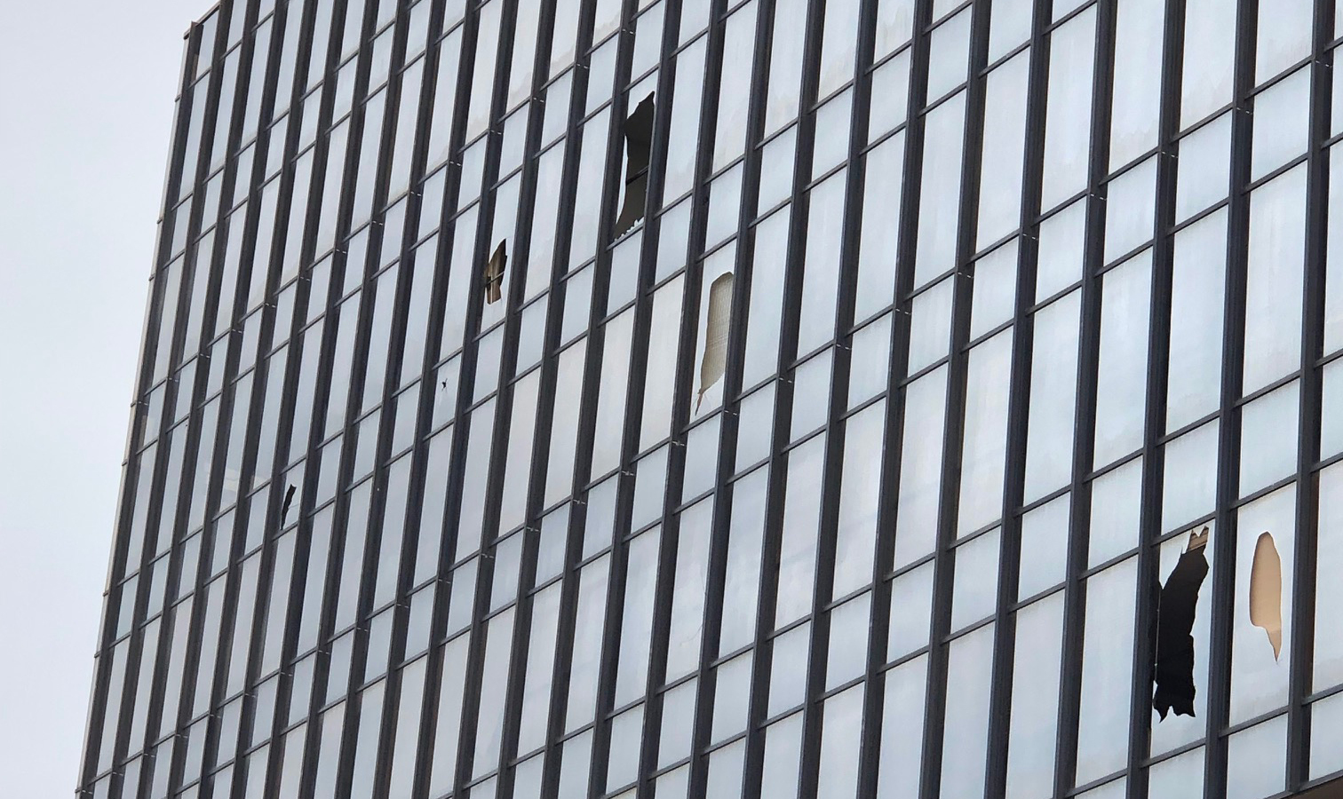 Broken windows in the Blackstone Building shortly after the demolition on Jan. 20.