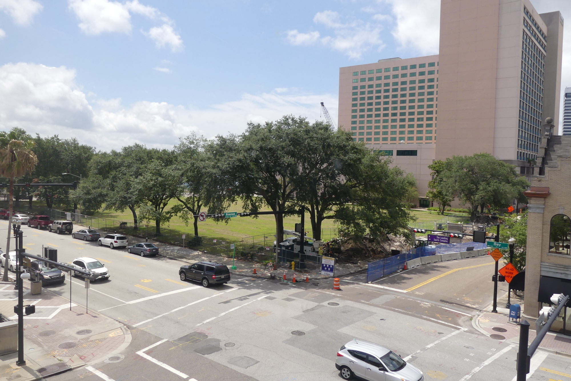 The former City Hall property along East Bay Street is covered by a lawn. The city wants to put the site, along with the former Duval County Courthouse, on the market by October.