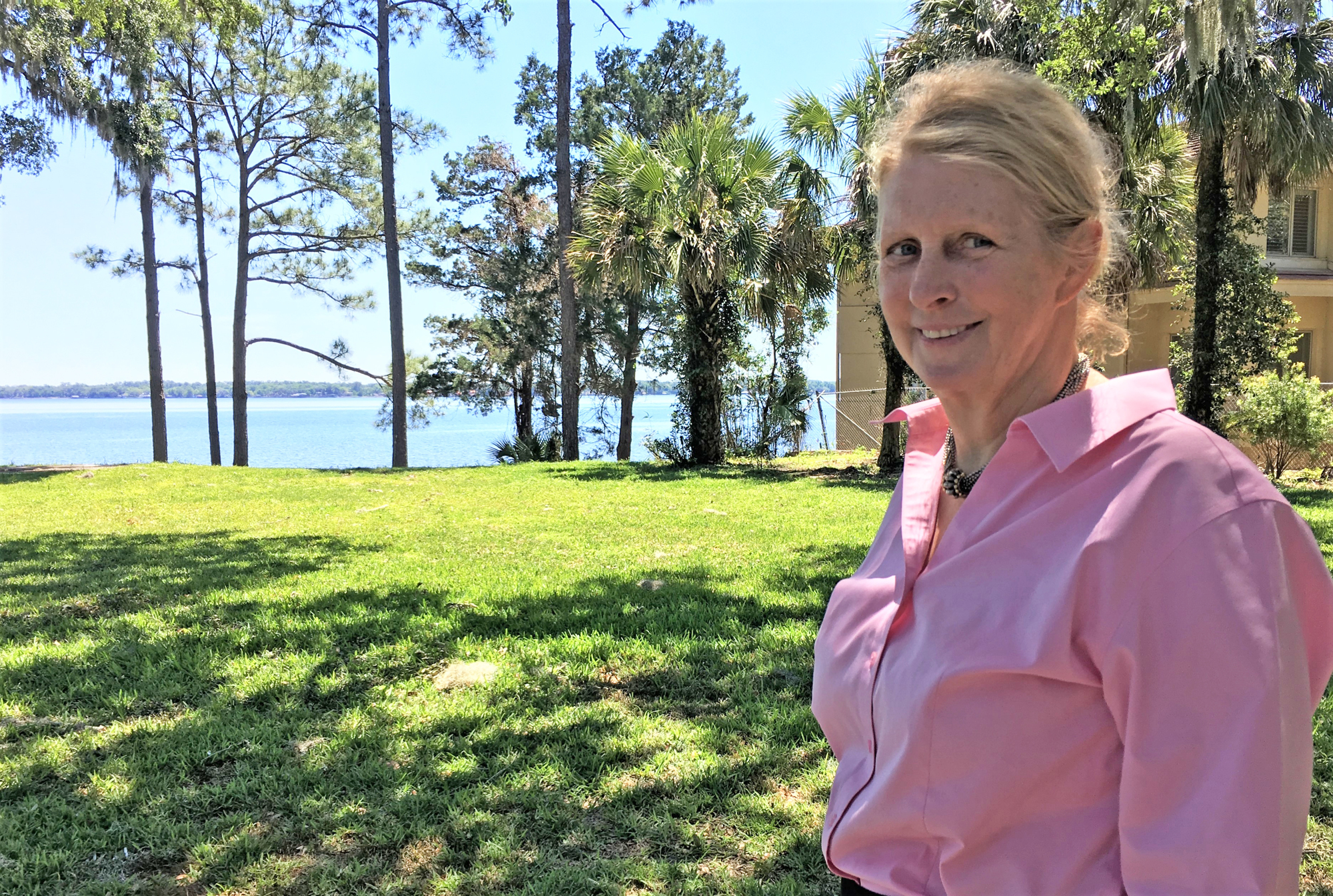 Karrie Massee shows off the riverfront views at Azaleana Manor.