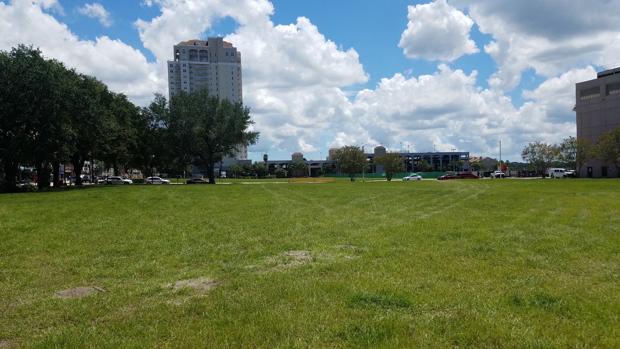 The view from Newnan Street looking east toward the Plaza Condominium at Berkman Plaza and Marina. The lawn is the former site of the old City Hall Annex that was imploded January 20.