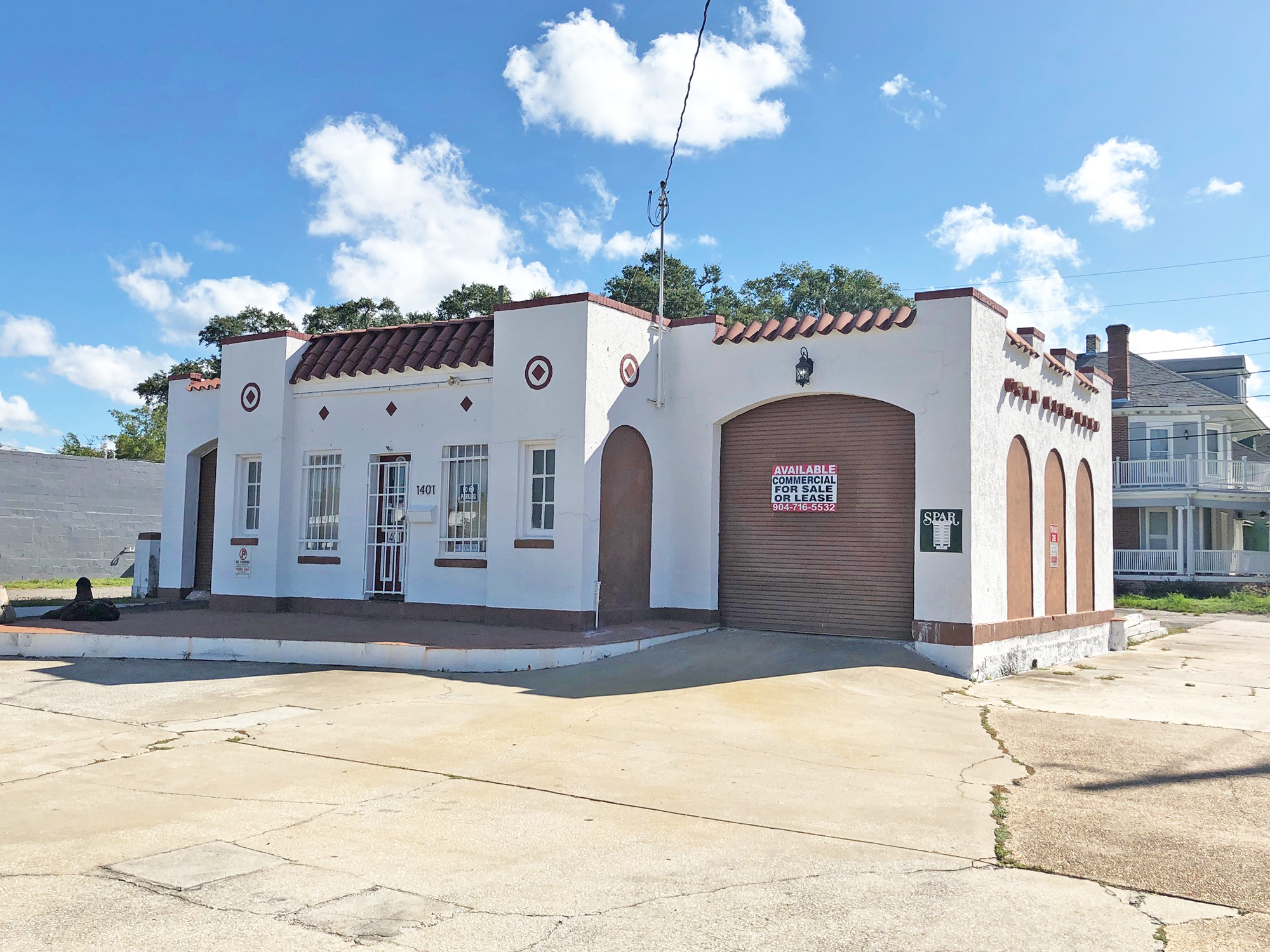 The 89-year-old former service station at Main and Fourth streets in Springfield remains available for sale or lease.