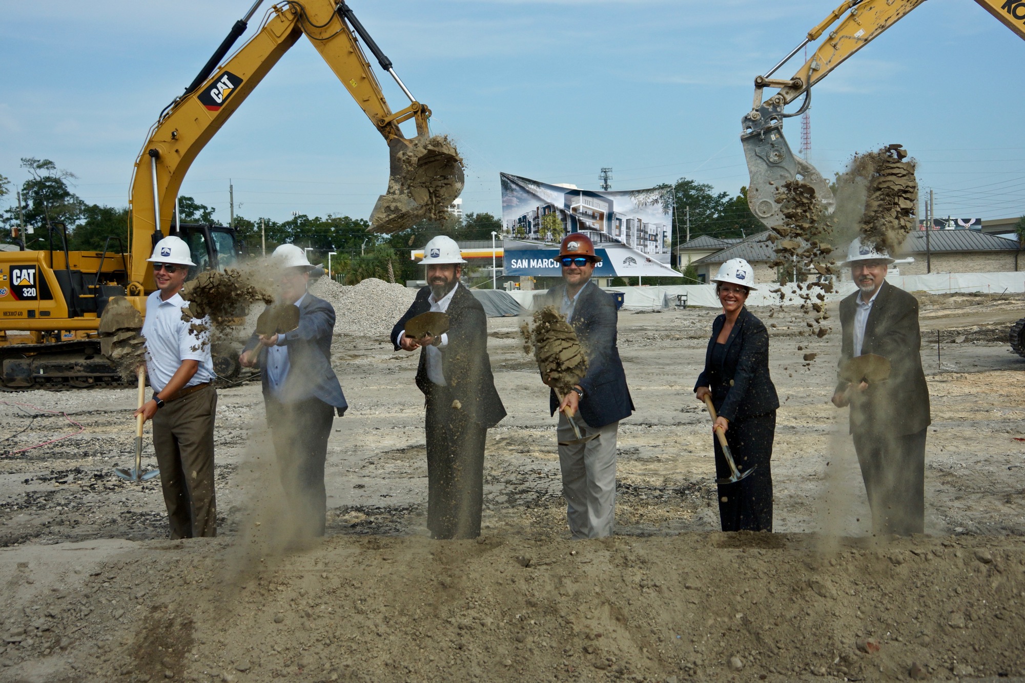 Live Oak Contracting, Chance Partners, Ameris Bank and City Council member LeAnna Cumber, second from right, break ground on the San Marco Crossing development.