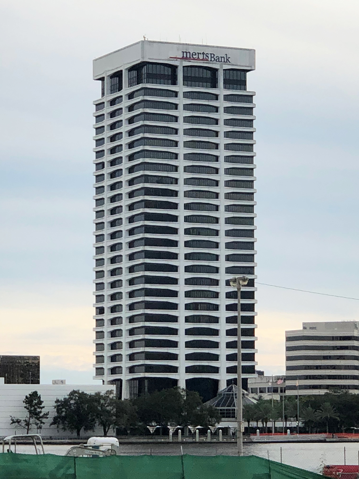 How Riverplace Tower looked Thursday afternoon with part of its sign removed.