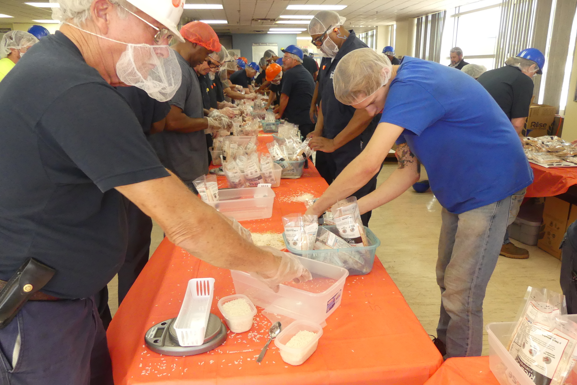 Each meal package was weighed before sealing to ensure it contained enough food to feed six people.