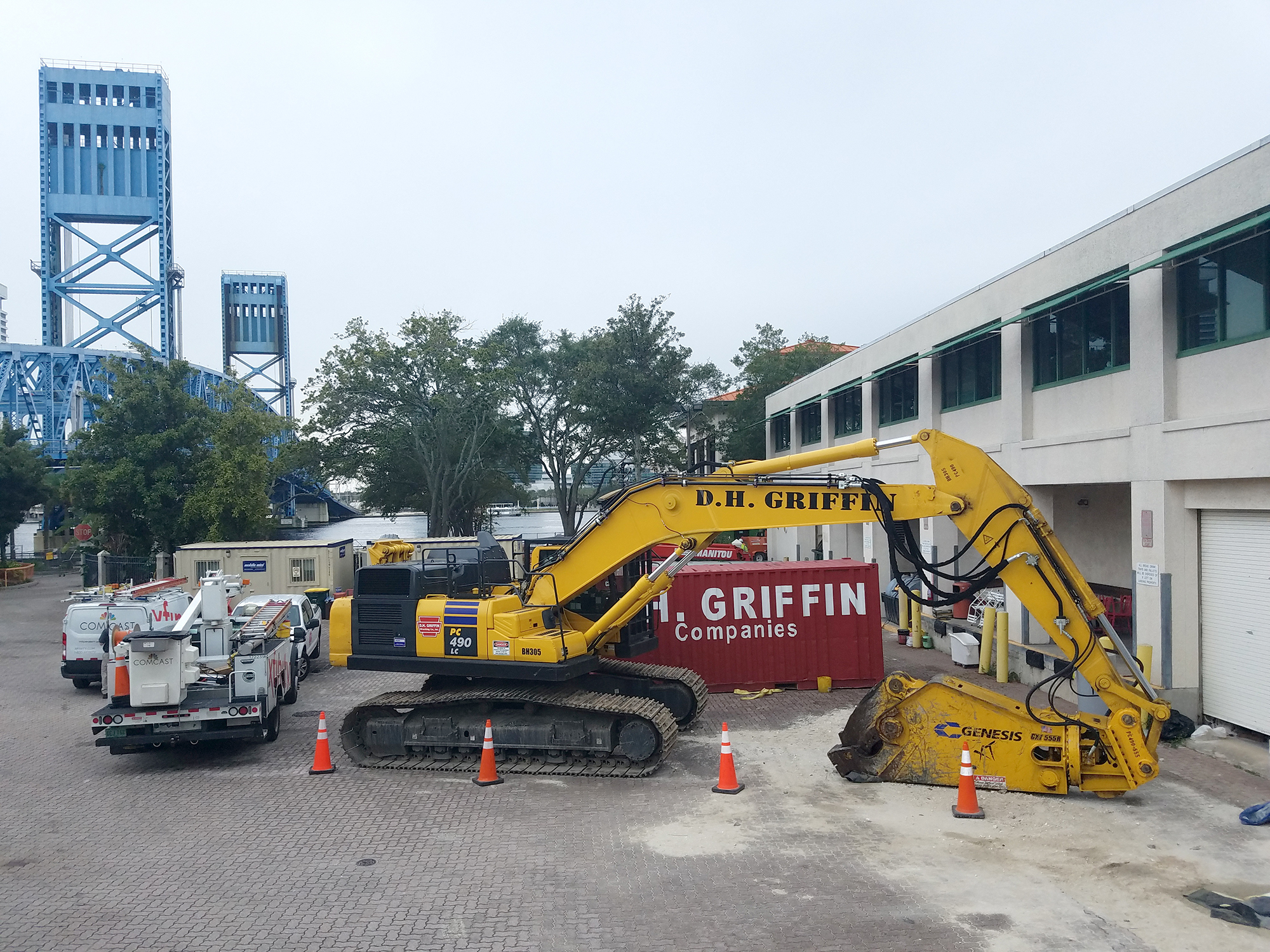 Heavy equipment from D.H. Griffin Wrecking Co. is positioned on the east side of The Jacksonville Landing .