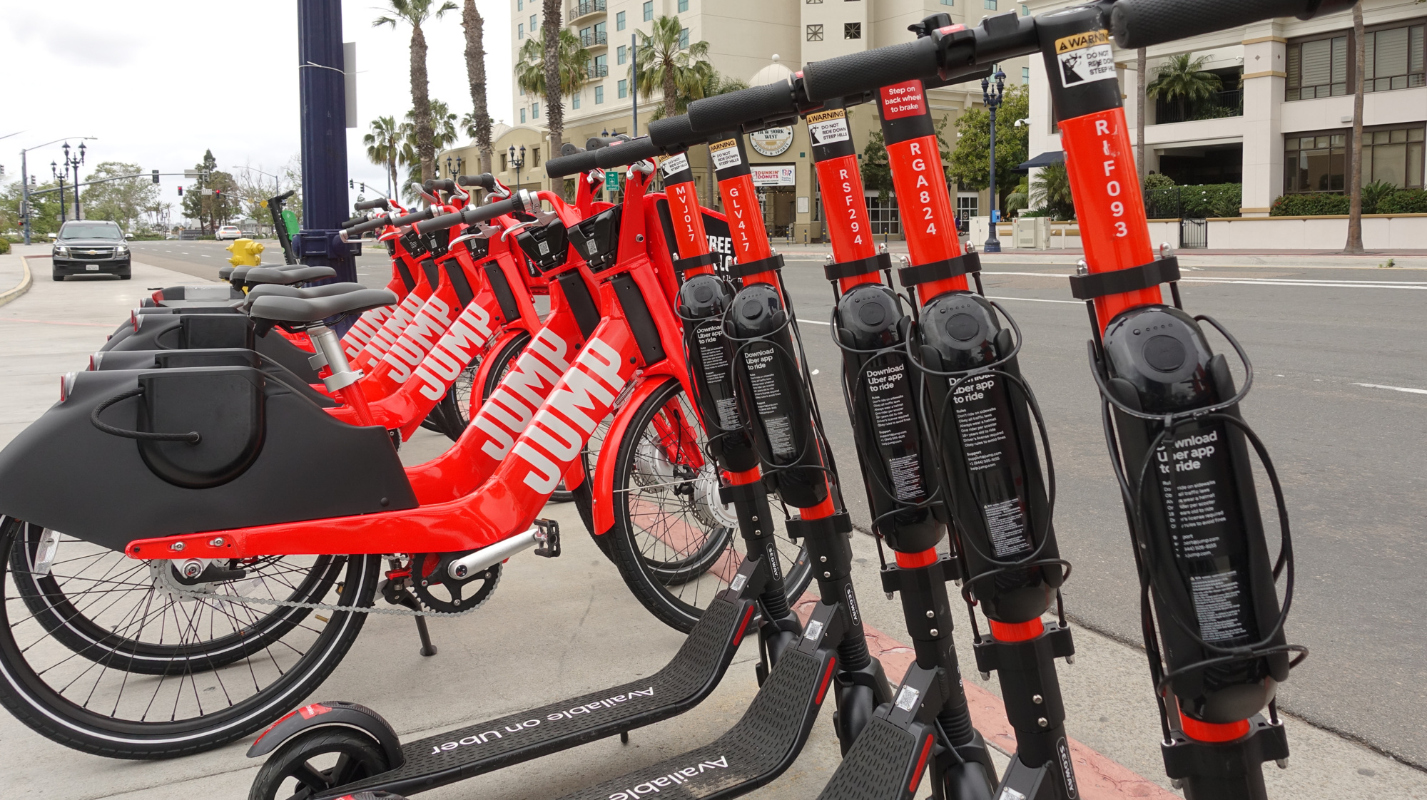 Dockless Jump electric scooters and bikes by Uber in downtown San Diego.