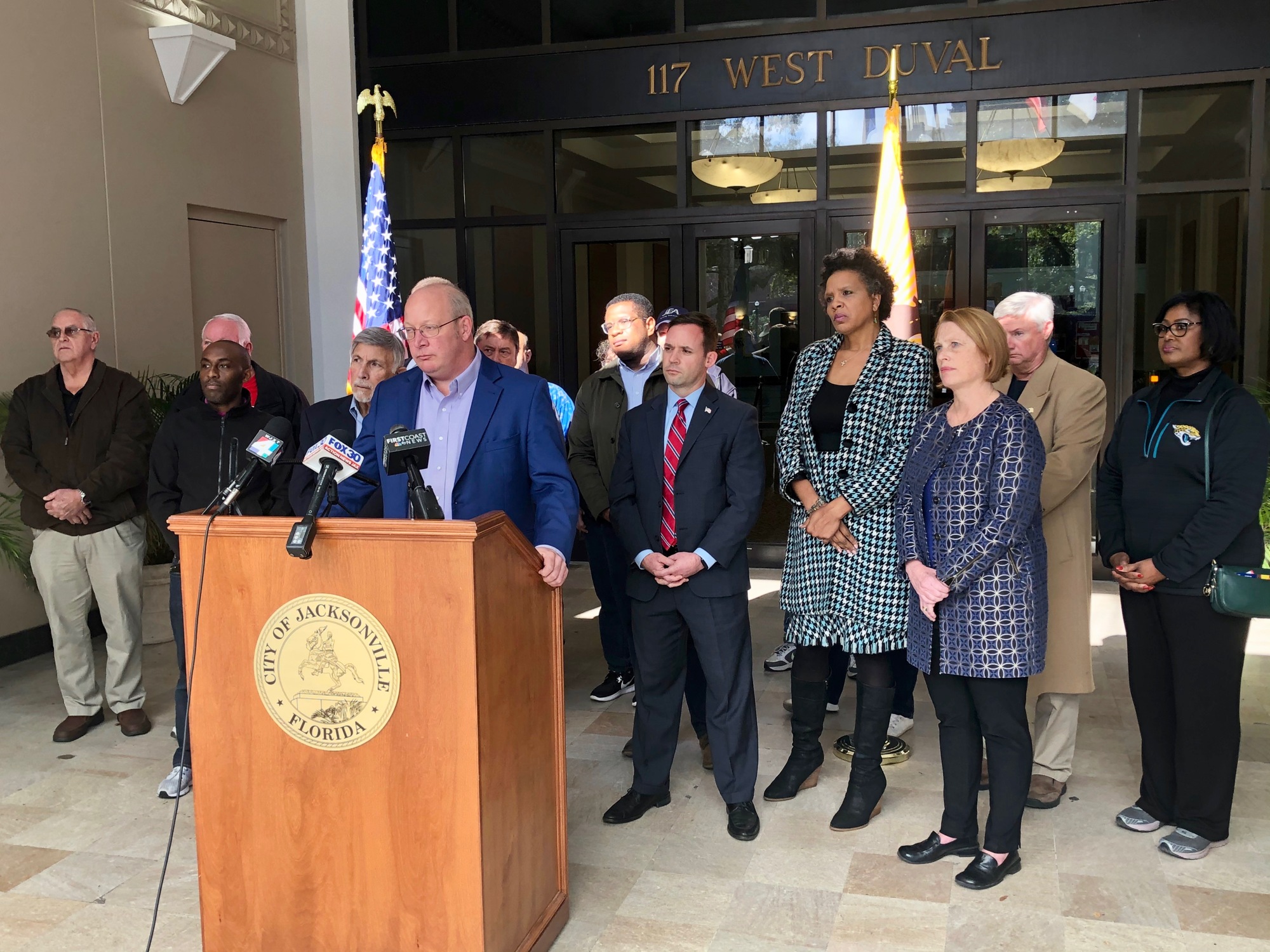 Council members, JEA employees and the chairs of the Duval County Democrat and Republican parties join City Council President Scott Wilson at the Jan. 20 press conference.