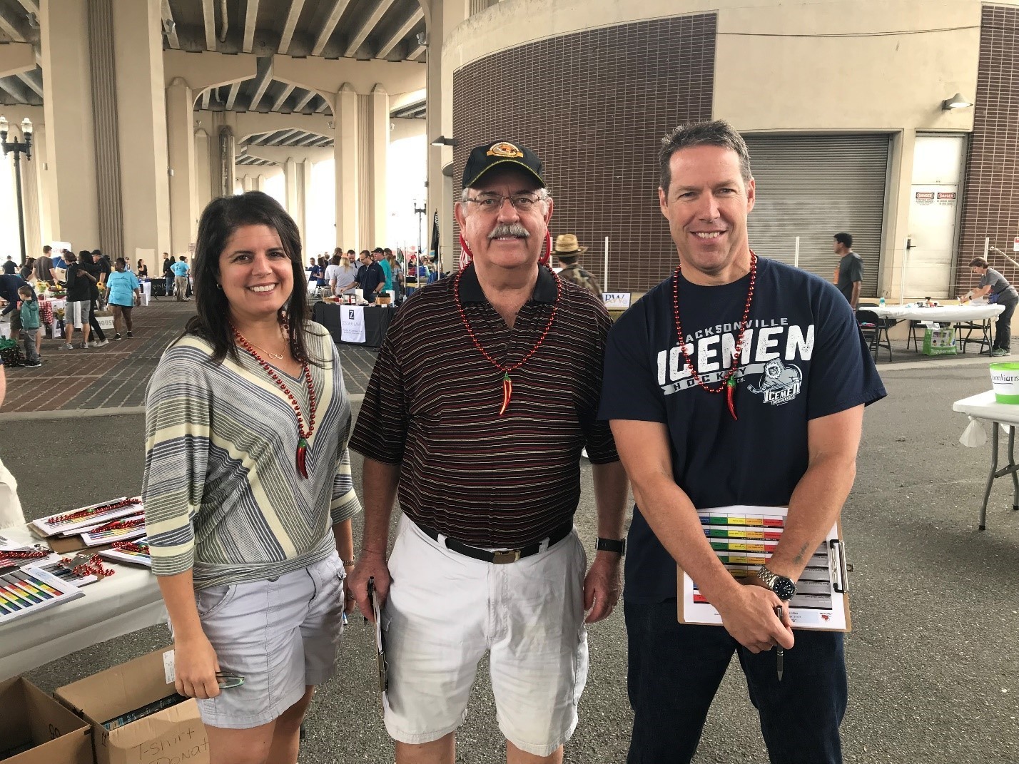 Cook-off judges Duval County Judges Michelle Kalil and Ronald Higbee and Circuit Judge John Guy at the 2018 Charity Chili Cook-off.