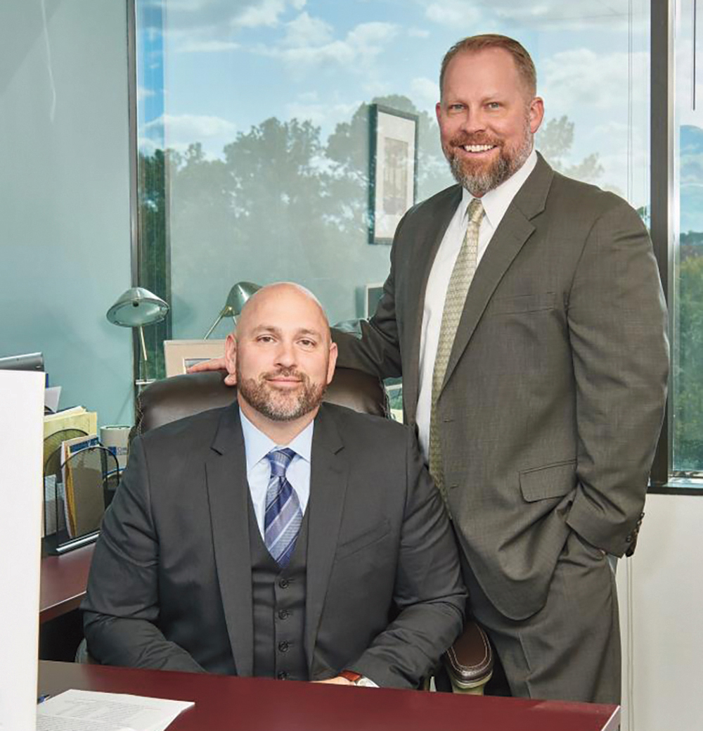 Attorneys Christopher Cobb and James Gonzalez.