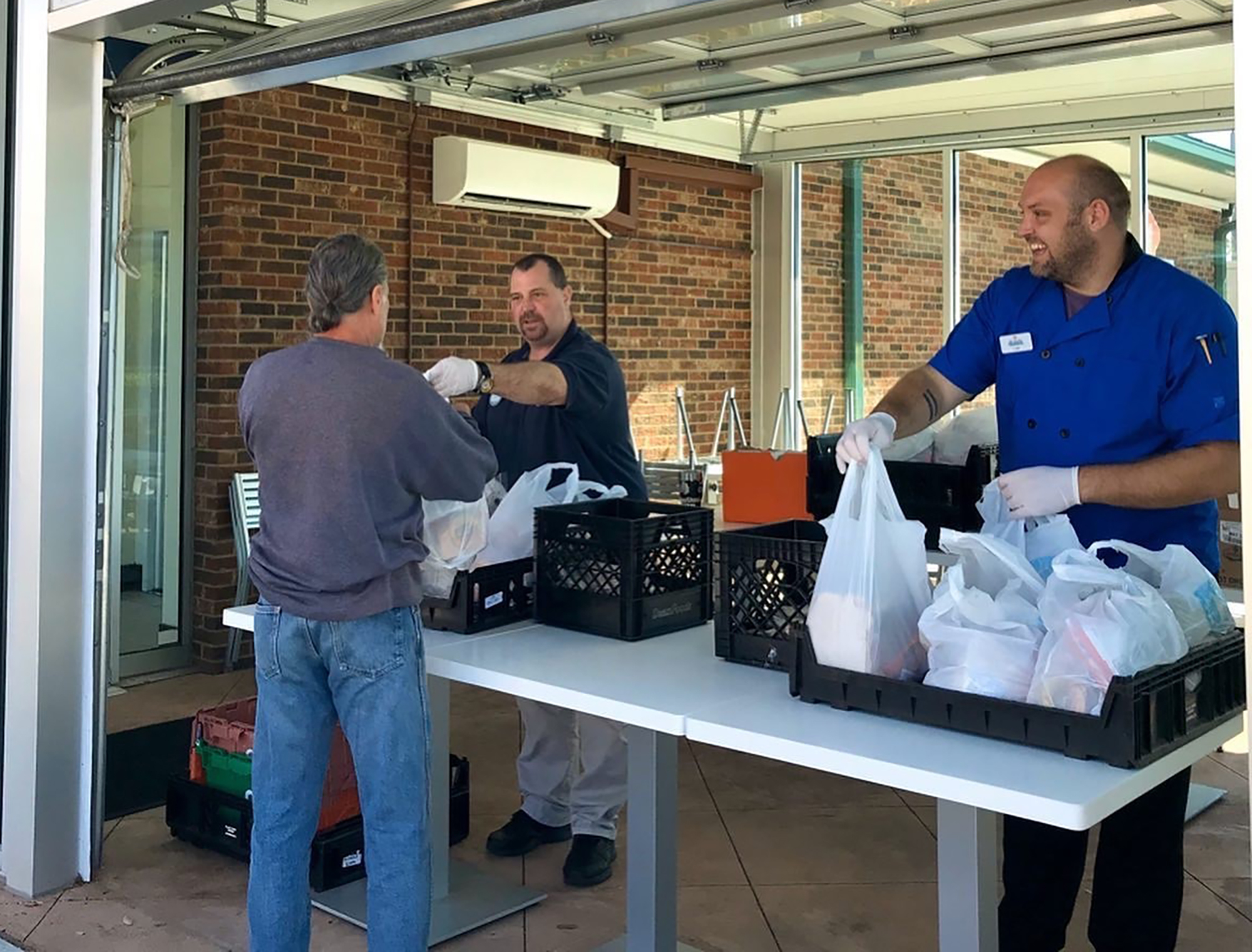 Daily's distributed about 100 packages that included a pound of deli meat, a loaf of bread from Village Bread, chips and sweet treats at each location.