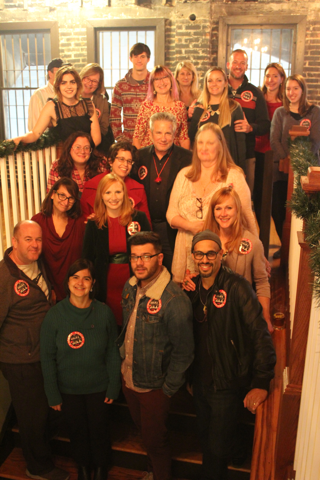 Former Folio Editor Claire Goforth, second row from bottom, second from left, and the publication’s staff at a holiday party in 2017.